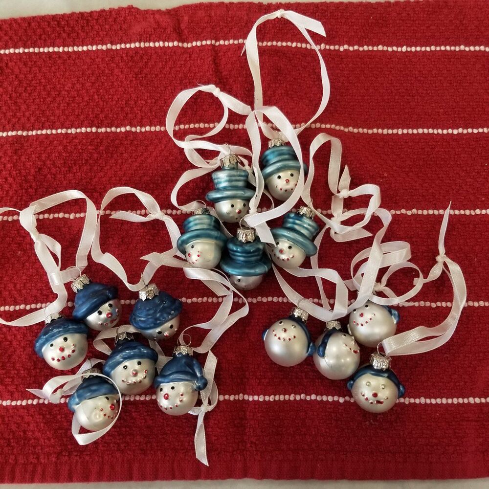 Small assorted snowman blown glass ornaments about 1" 14 count